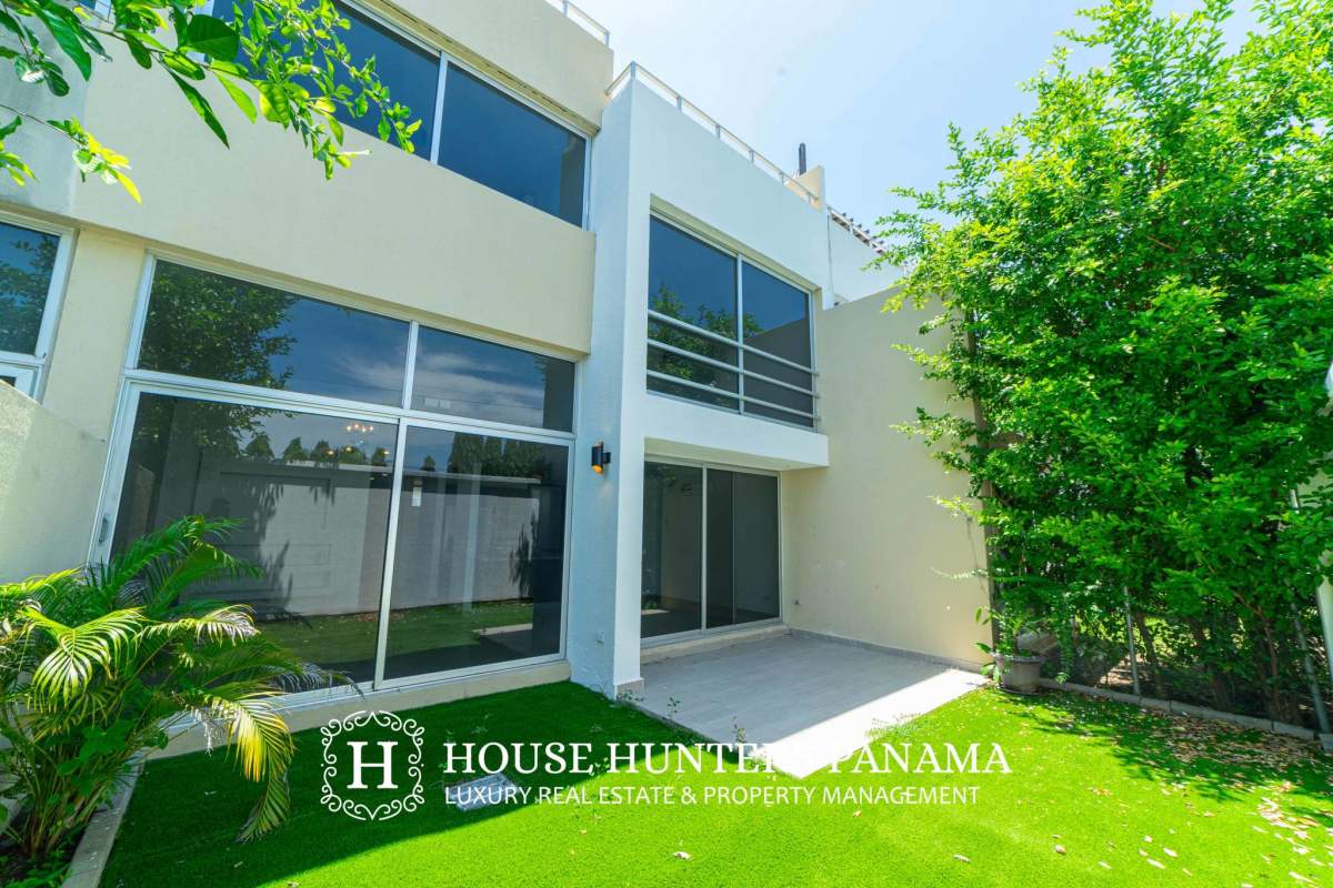 Modern kitchen with granite counters and stainless appliances Costa Sur Village townhouse Panama