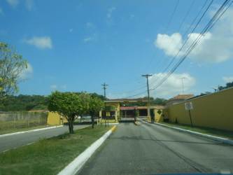 Covered porch with columns exterior of house in La Alborada Colón Panama