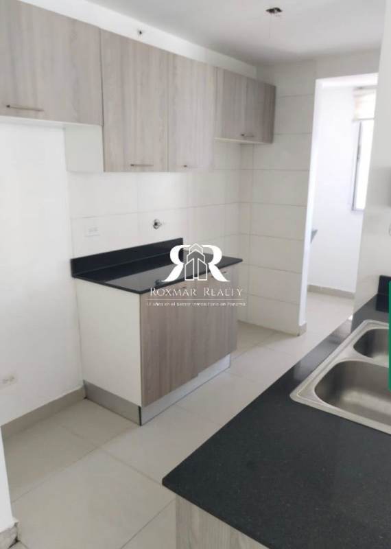 Modern open kitchen with granite counter double sink in PH Coral Towers Panama City