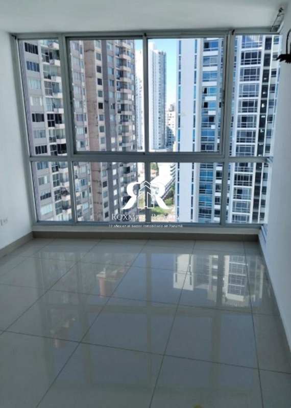 Living room with ceramic tile large windows urban apartment PH Coral Towers Panama City