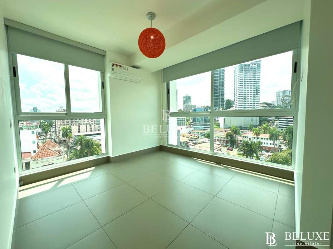 Modern bathroom with walk-in glass shower, floating sink PH Altamira Residences Panama