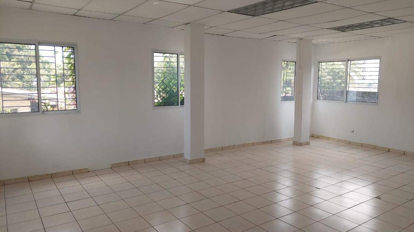 Interior view with glass partitions and tiled floors commercial office San Miguelito Panama