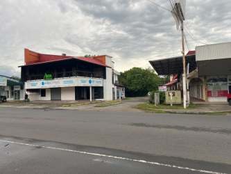 Corner view of two-story commercial building with balconies in David Panama