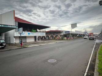 Shopping plaza with large signage area and storefronts David Chiriquí Panama