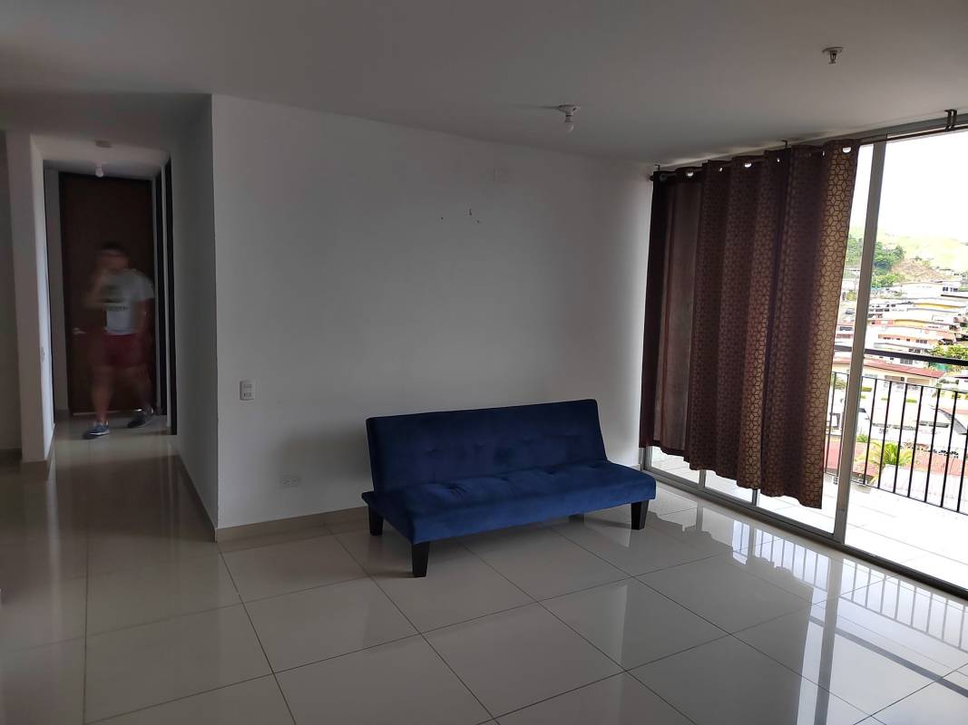 Bright living dining room with ceramic floors and balcony access in Altavista Tower Panama