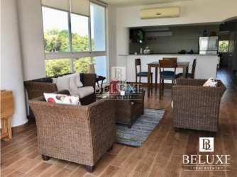 Bright living dining room with large windows ocean view PH Miramar Loft Rio Hato Panama