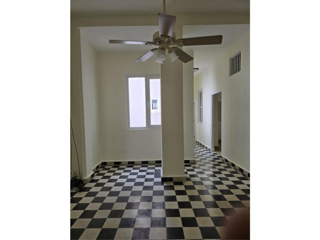Bathroom with walk-in shower, beige and blue tiles in luxury historic penthouse Casco Viejo Panama