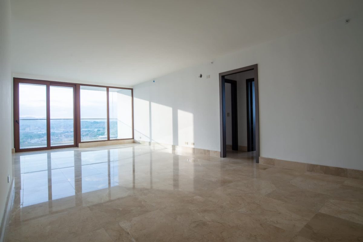 Spacious modern bedroom with ensuite bath, marble flooring, view of golf at Santa María Panama