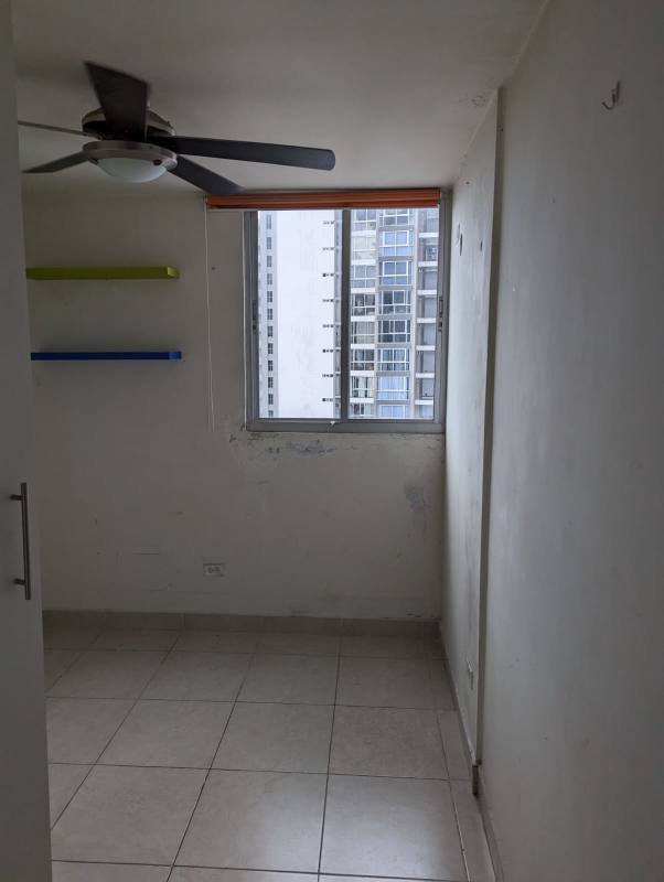 Small room with colorful shelves and ceiling fan in PH Splendor By The Park Carrasquilla Panama