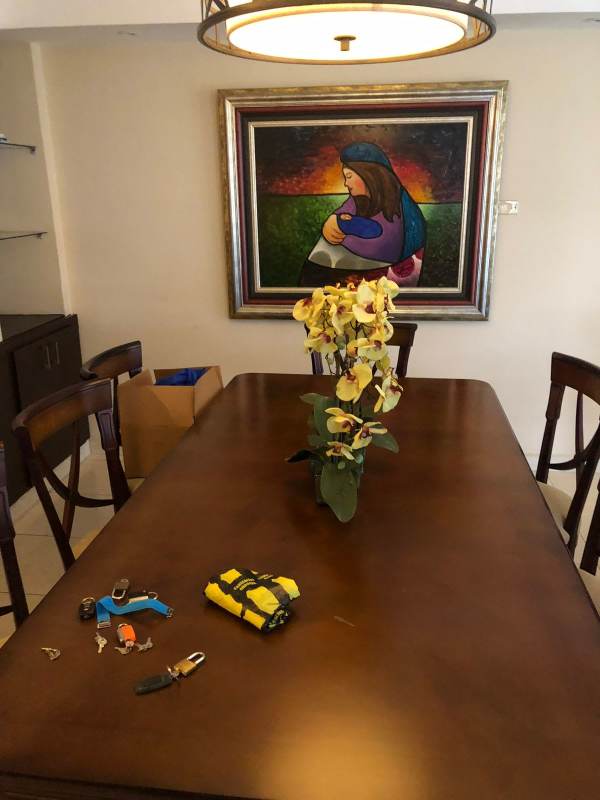 Elegantly tiled bathroom with glass shower enclosure PH El Cangrejo Panama