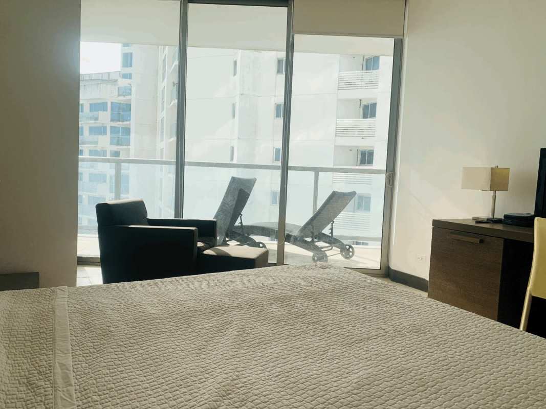 Bedroom opening to private ocean-view balcony PH The Ocean Club Punta Pacifica