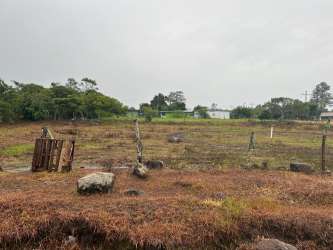 Volcán Nueva California paved access road beside corner lot for sale