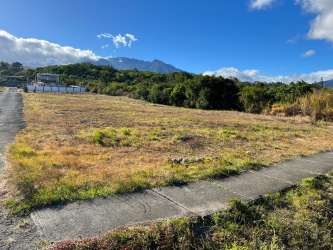 Large vacant plot suitable for plaza apartments or mixed use in Alto Boquete with sky and mountain backdrop