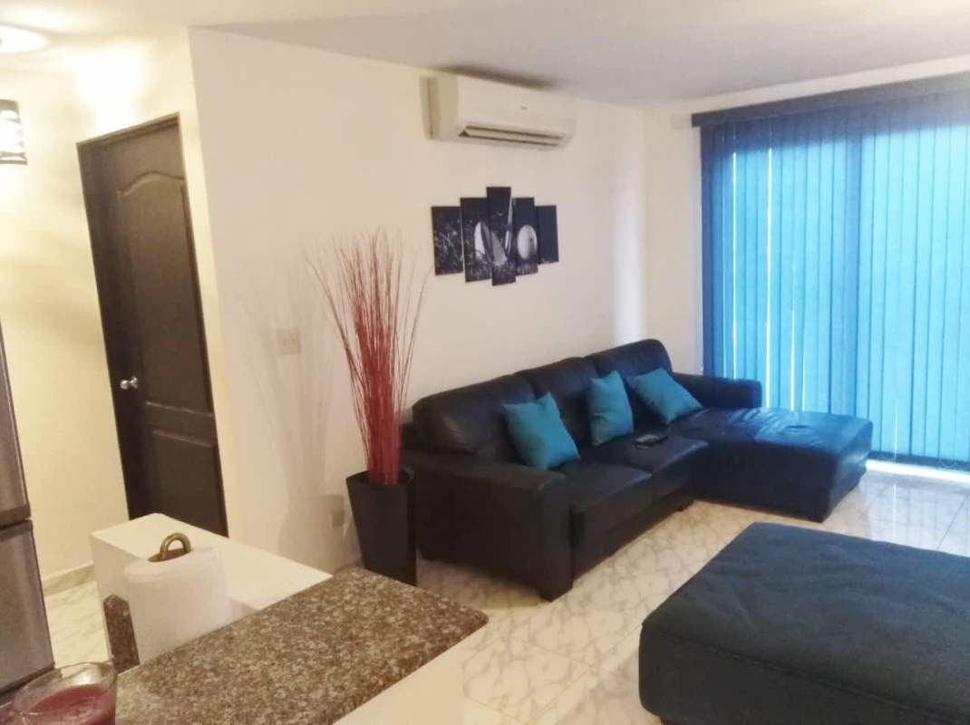 Kitchen with granite countertops, stainless appliances, wood cabinets at PH Parque Lindo Panama