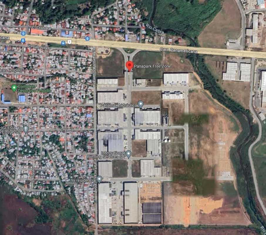 Bird’s eye satellite view of Panapark Free Zone with river and residential surroundings in Panama