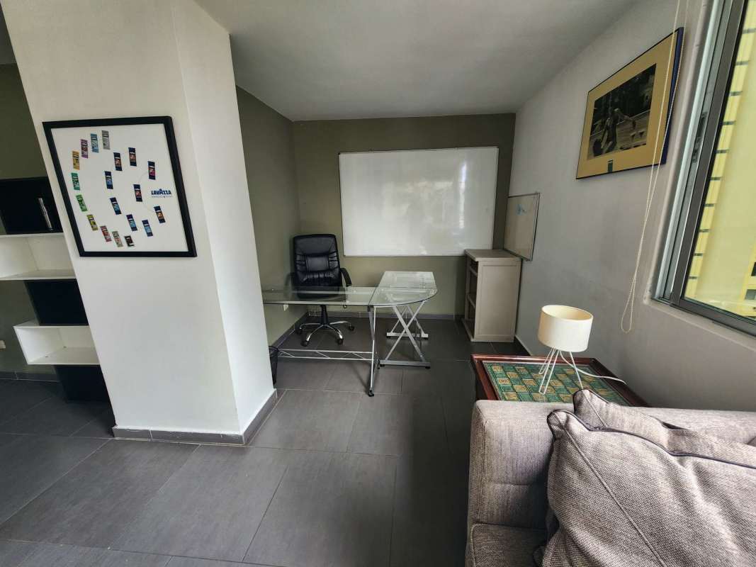 Full bathroom with modern fixtures and glass shower in PH Ocean View Panama City.