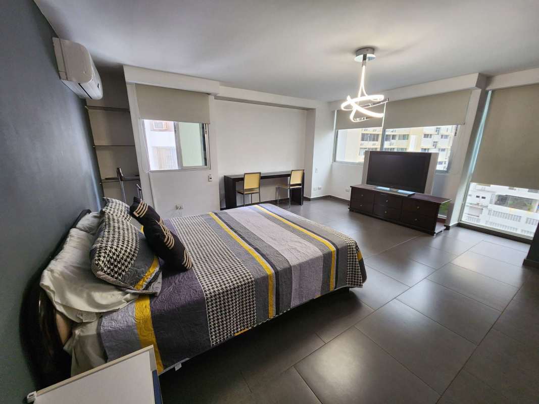 Bright furnished second bedroom with AC and bathroom in Punta Paitilla PH Ocean View for rent.