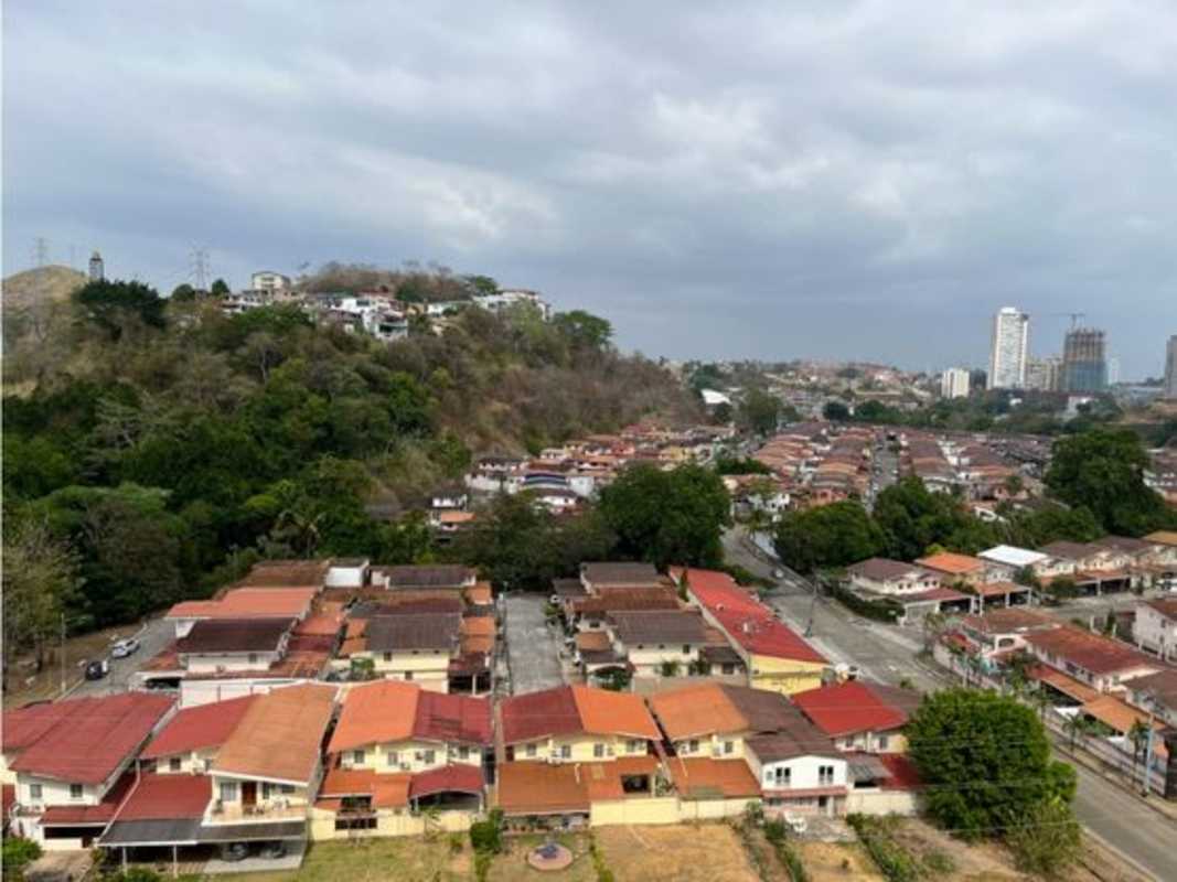 Spacious unfurnished living area with large porcelain floors and balcony at PH Condado Country Club