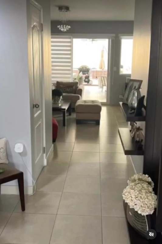 Contemporary beige two-story house with carport in Brisas del Golf Panama