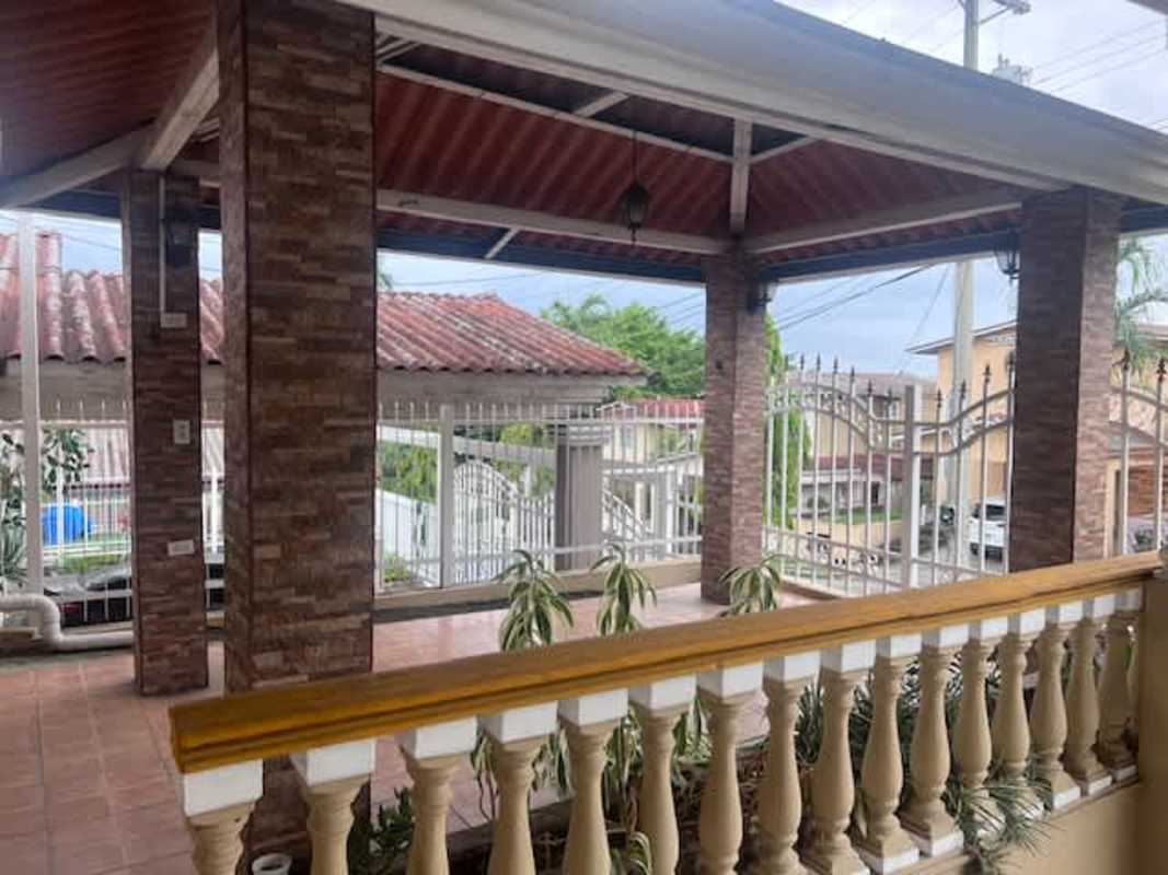 Bedroom with tile floors, split AC, ceiling fan and window Villa Zaita Panama for sale