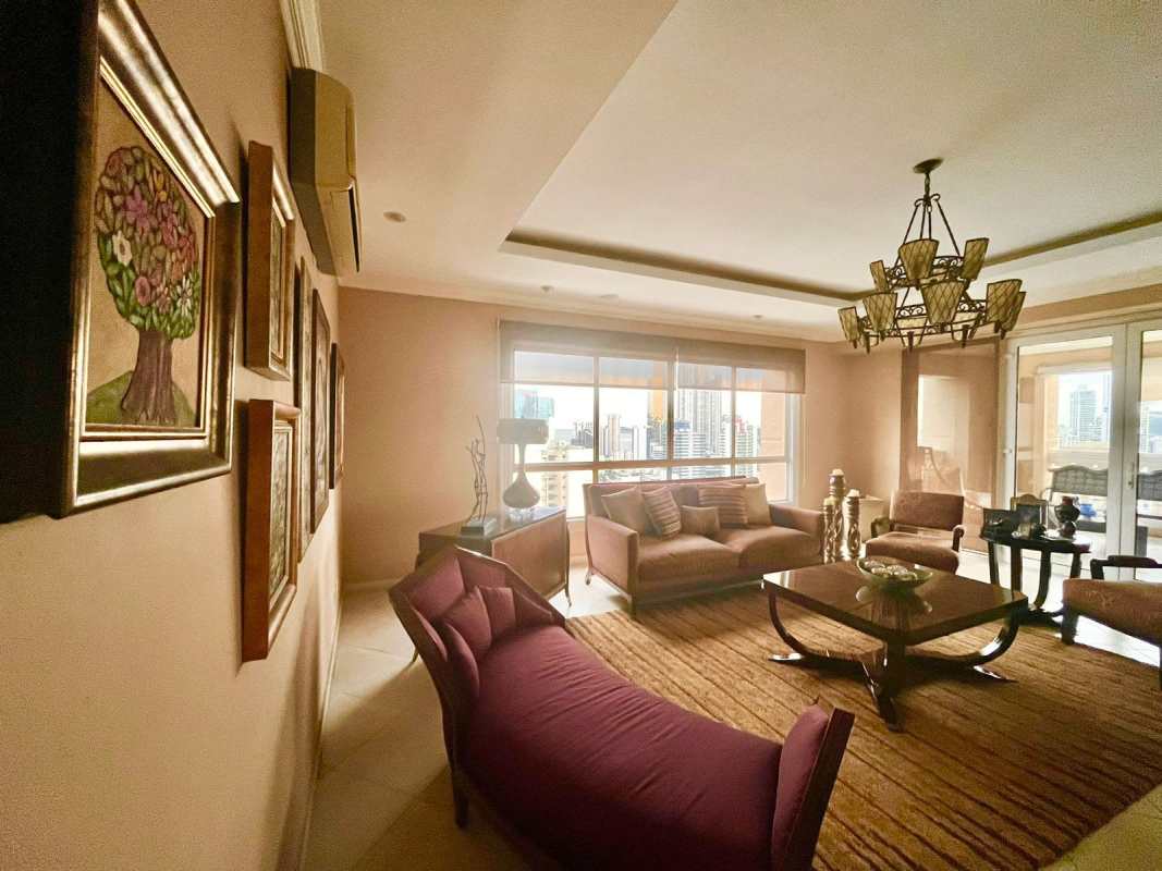 Spacious living room area with tray ceiling and elegant decor at PH Victoria Tower, Obarrio Panama