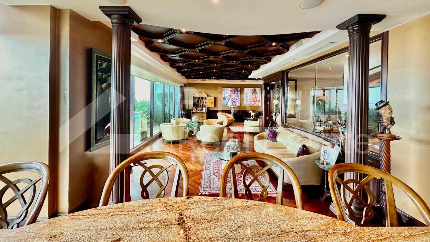 Spacious living room with panoramic windows ocean view elegant furnishings PH Ocean One Panama