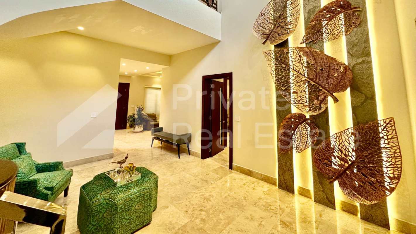 Elegant master bedroom with balcony access luxury house Toscana del Este Panama