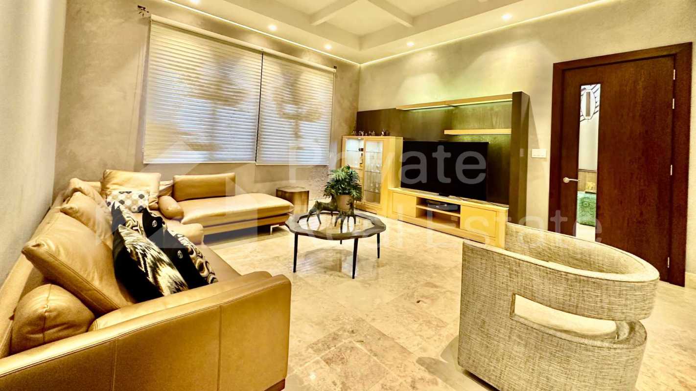 Spacious contemporary living room with marble floors in luxury Costa del Este house Panama
