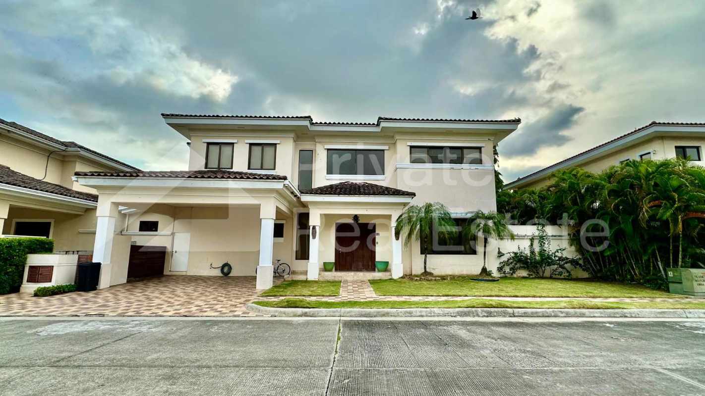 Luxury private pool surrounded by lounging area in Costa del Este house Panama