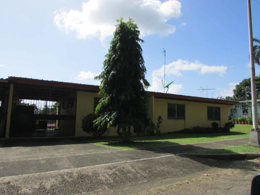 Street view of yellow house with driveway garden Pedro Miguel Clayton Panama