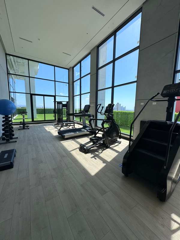 Fully equipped gym with natural light and city views PH Centerpoint Panama City