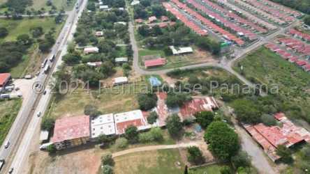 Large development land with multiple buildings along Interamericana Highway in Aguadulce Panama