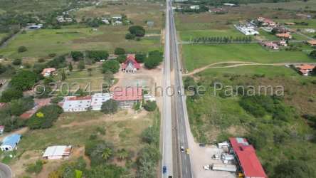 Aerial panoramic view showing open commercial plots and surrounding countryside Aguadulce Panama