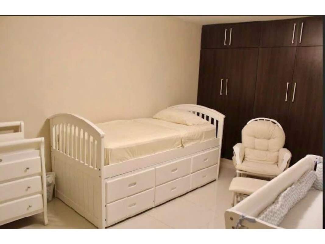 Spacious living room with large window, tile flooring, couch in PH Royal Princess Punta Paitilla Panama