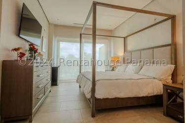 Contemporary kitchen with quartz counters and full appliances in Playa Escondida beach villa Panama