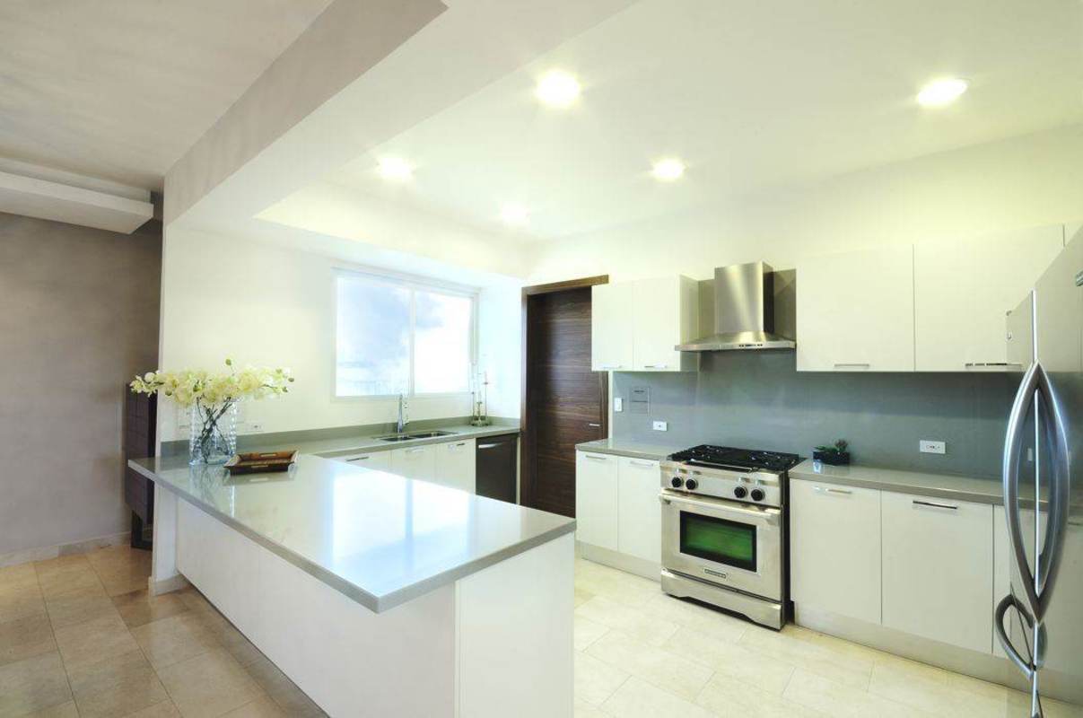 Contemporary bathroom with double sink vanity and glass shower in Santa Maria Panama