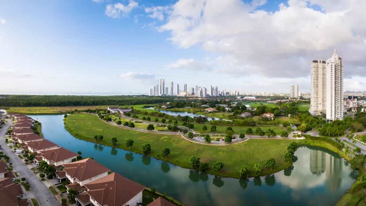 Golf front lots in Peninsula Estates with Panama City skyline in the background