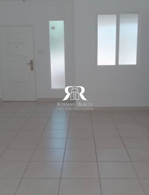 Spacious empty living room ceramic tile floors windows Paseo del Norte Panama City
