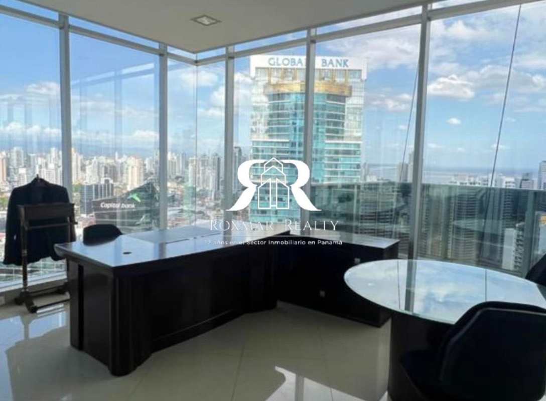 Modern executive corner office with floor-to-ceiling windows panoramic skyline PH BICSA Calle 50