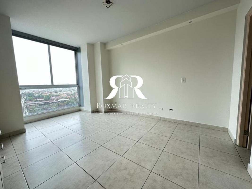 Spacious living room large window city view tiled floors PH Lexington El Cangrejo Panama City