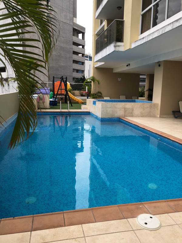 Spacious living room with natural light, panoramic city views in Obarrio Panama