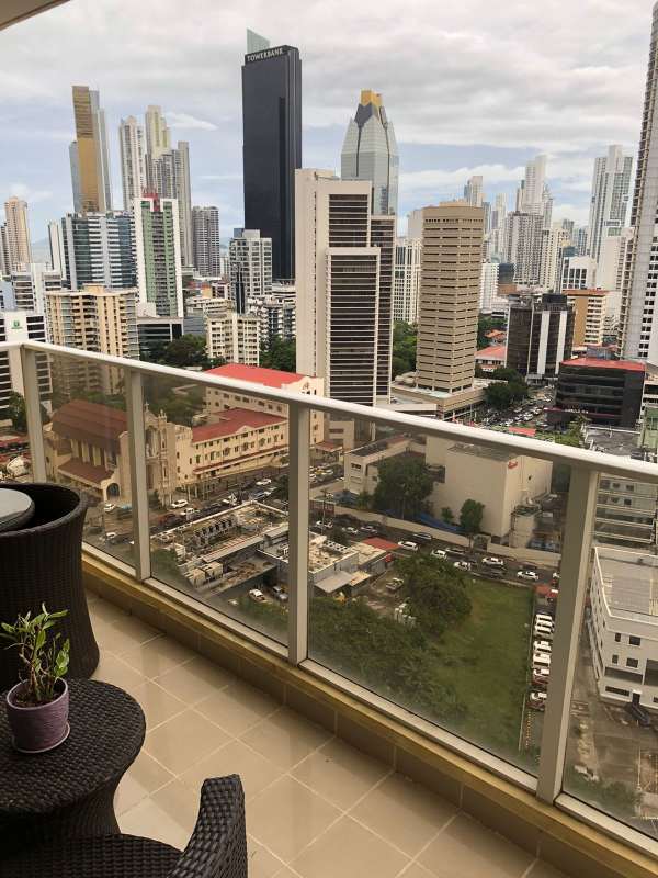 Wide balcony with skyline view and terrace seating PH Obarrio 66 Panama