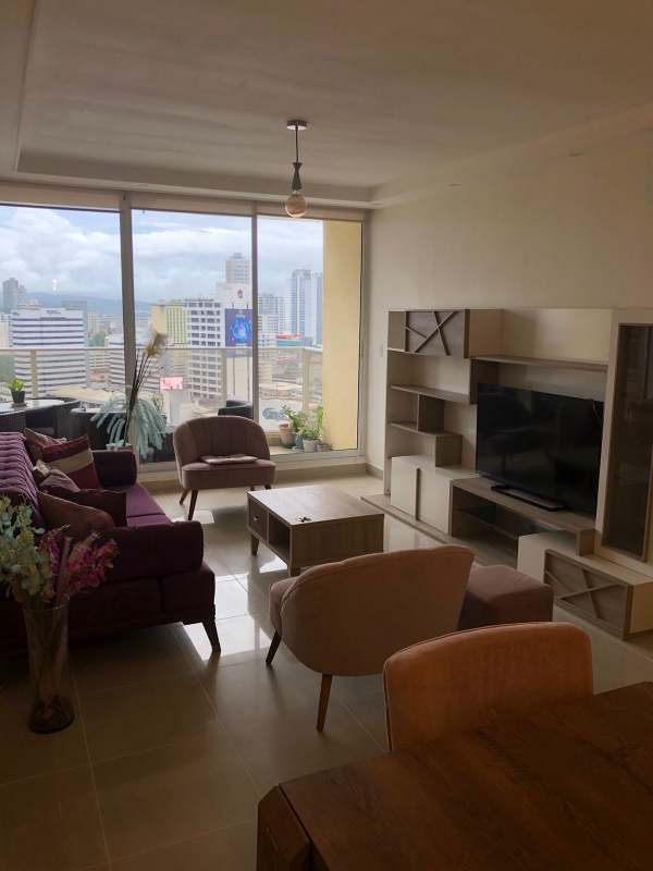 Furnished second bedroom with closet, large window and ceiling fan Obarrio Panama