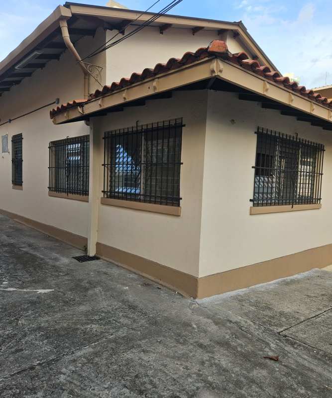 Spacious living room with decorative vintage tile floor and archways in Bella Vista Panama for rent