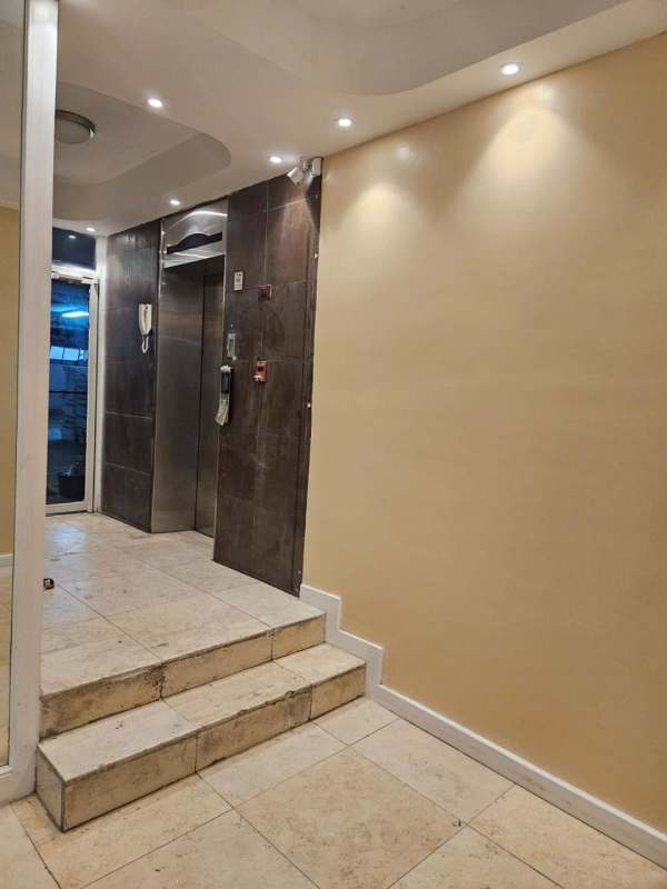 Multi-story commercial building exterior with balconies Panama City