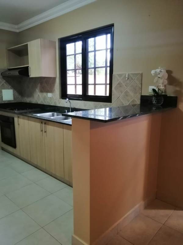 Private courtyard with lawn terracotta tiles patio PH Versalles Costa Sur