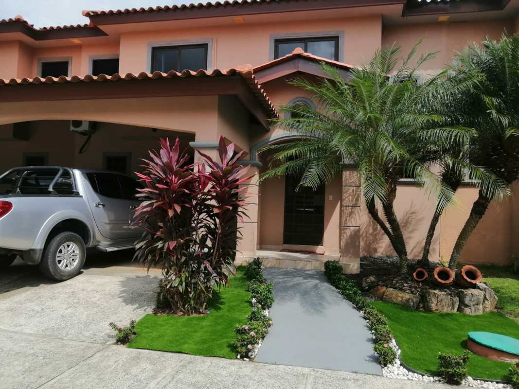 Mediterranean-style facade two-story house with carport in PH Versalles Costa Sur Panama