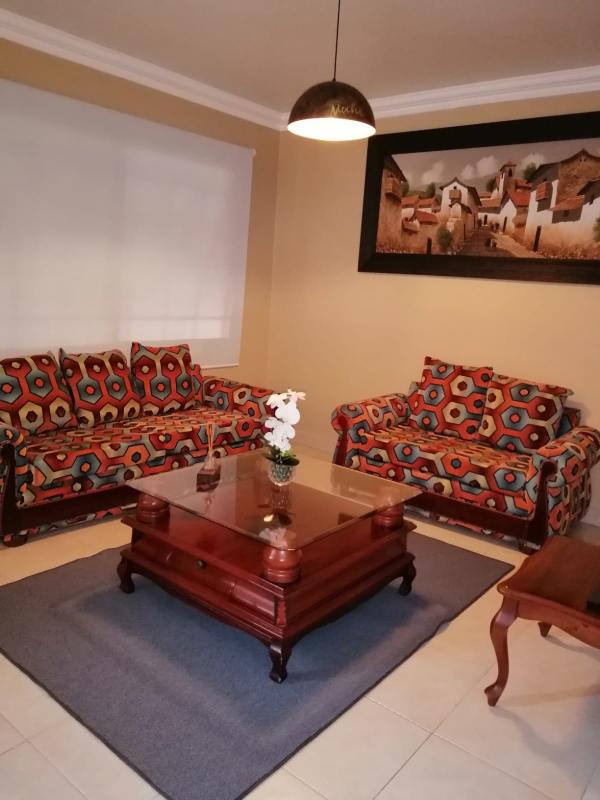 Eclectic living room colorful sofas lamp in PH Versalles Costa Sur Panama