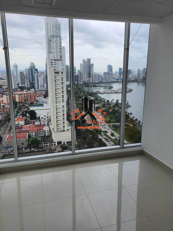 Wide modern office area with panoramic ocean and city view in Panama City PH BOC Tower