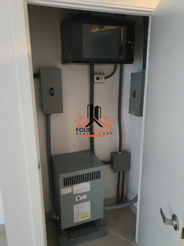 Utility closet with power panels and transformer PH BOC Tower Panama